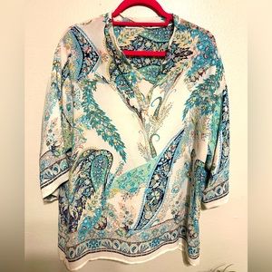 Mid length sleeves extremely comfortable & very pretty blouse.